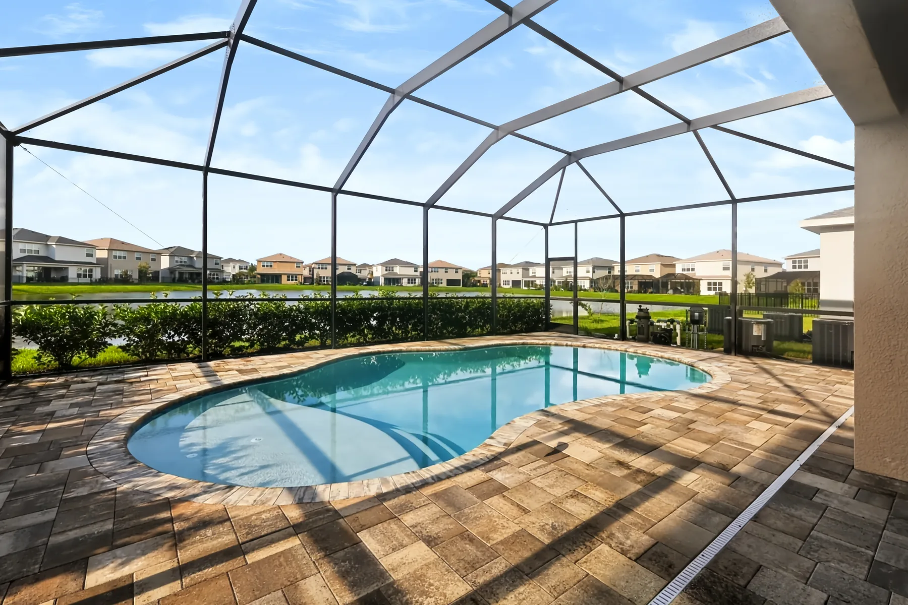 Screened pool and outdoor area photographed for a Tampa Bay listing